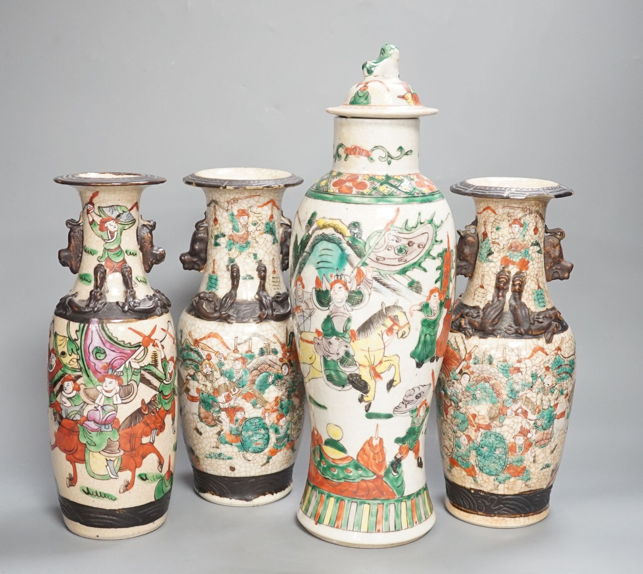 A pair of Chinese crackle glaze vases, a similar vase and cover, and another, late 19th/early 20th century (4), tallest 29 cms high.